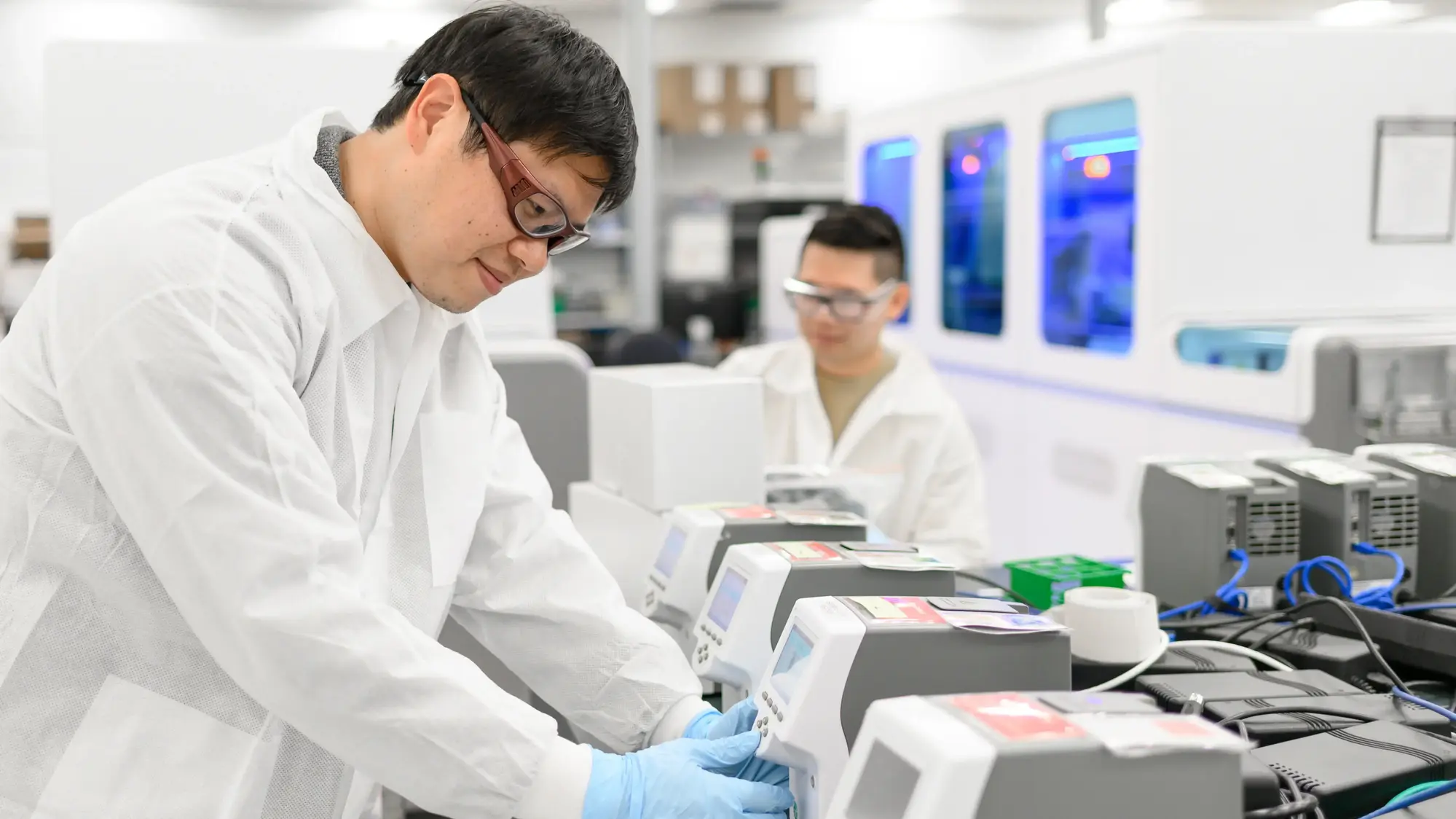 Scientist working at the laboratory bench with LabOperator